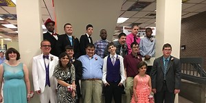 Students with special needs walk the red carpet at CBT Prom