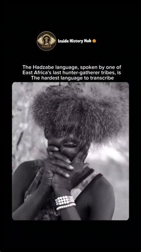 Inside History Hub on Instagram: "The Hadzabe language, spoken by one of the world's last remaining hunter-gatherer tribes in Tanzania, is a linguistic anomaly. Unlike most languages that use clicks as mere sound effects, Hadzabe uses them as fundamental consonants. These sounds—ranging from dental "tsks" to the hollow "pop" of a cork (alveolar clicks)—are integrated into the flow of speech with a precision that allows hunters to communicate silently and efficiently in the bush without scaring a