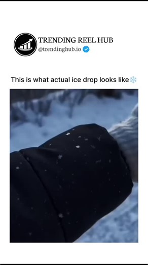 TRENDING REEL HUB on Instagram: "The post features a short video revealing what an actual ice drop looks like, capturing the precise moment liquid transforms into crystal, surprising viewers with its sharp edges, clarity, and frozen elegance. Physics explains the phenomenon through rapid phase change and crystal nucleation, where temperature and surface tension dictate how water instantly locks into structured ice. User replies admire the unreal beauty of the frozen drop, offering an accessible 