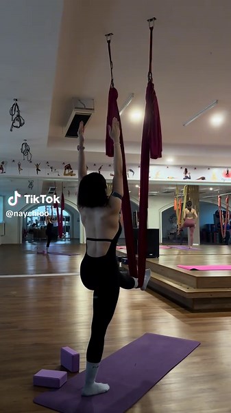 Aerial Yoga Techniques Using Red Silks: A Full Guide