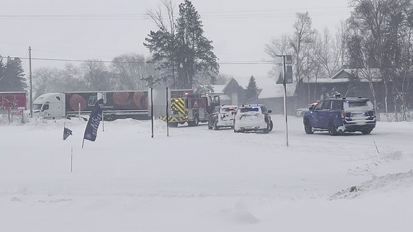 Man seriously injured after driving under semi, getting pinned in on Lake Michigan Drive