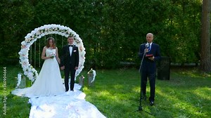 Pastor Praying for Bride and Groom at Wedding Ceremony on Nature. 2x Slow motion - 0,5 Speed 4K 60 FPS