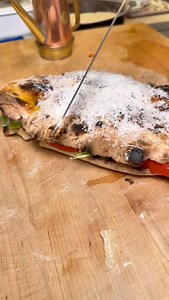 1.2K views · 1K reactions | Quick beach sandwich—so good and stayed nice and crispy.  Lemon mascarpone cheese base, seasoned tomatoes, arugula, salami, and prosciutto, finished with olive oil and shavings of Parmigiano Reggiano. Used leftover sourdough from making Sicilian-style pizza—78% hydration. Baked in the @gozney dome | Seanspizza | Facebook