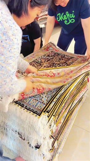 These 2x3ft(60x90cm) handmade silk rugs with different patterns were packed up and delivered