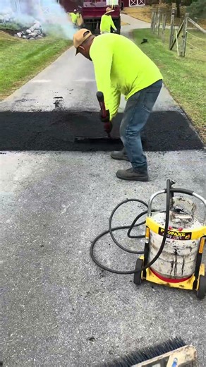 Infrared patching asphalt driveways using the kasi patriot system.