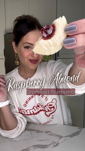 RASPBERRY ALMOND SHORTBREAD THUMBPRINTS ❤️🤍 The epitome of a Christmas cookie CLASSIC, these are a MUST-BAKE in my kitchen every holiday season. 🎄🍪 * Reposted because my original got cut off 🫣 I’ve played with a few other thumbprint recipes over the years, but this one is just SO classic and simple, and it makes the most perfect little almond cookies. They smell like the cookies my grandma used to bake and bring back all sort of warm and fuzzy seasonal memories. 🥰 I used raspberry preserves