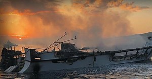 Dive boat wreckage lifted out of the ocean