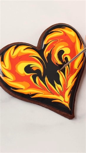 These wet on wet royal icing cookies are a remake of a design I made in 2017! The instructions and recipes to make these cookies for Valentine's Day are available to members of the Cookie Art Club ❤️‍🔥 | SweetAmbs