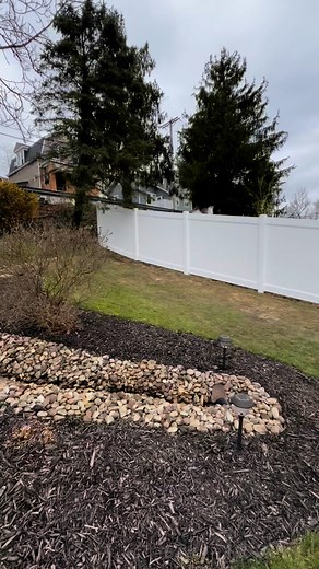 6 foot high PVC on a steep grade | E&E Fence