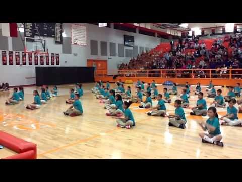 We Will Rock You! Second graders perform rhythm stick routine