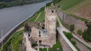 Burg Ehrenfels Castle ruins amid hillside vineyards of Rhine river gorge, Germany