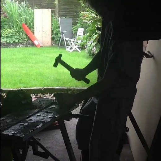 Hitting a 12 gauge shotgun shell with a hammer