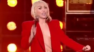 Miley Cyrus suffers awkward wardrobe malfunction leaving her topless on stage