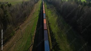 Shipping containers transportation on freight train by railway. Cargo Containers On Railroad. Intermodal Container On Train Car. Rail Freight Shipping Logistics. Multimodal Freight Transportation.