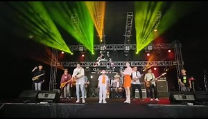 Live Band Performance Under Night Sky