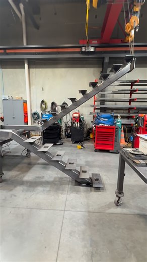 Tony Ratcliff on Instagram: "Austin finished up this monorail and it’s ready for powder coating. #monorail #stairs #welding #fabrication #manufacturing #lasercutting #fabricator"