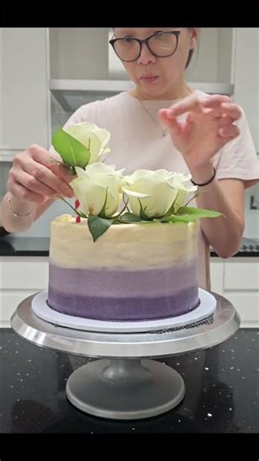 Creating a Stunning Purple Ombre Cake with Floral Decor