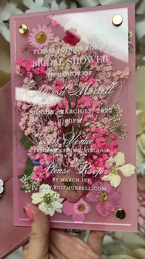 3D real dried flowers acrylic invitations made by Boxed Wedding Invitations. Pink frosted acrylic, dried flowers and clear acrylic #driedflowers #bridalshowerinvitations #3dinvitations #wowfactorinvitations #boxedweddinginvitations #customstationery #customdesign #uniqueinvitations #youareinvited #acrylicinvitations #acrylicinvites #bridalshowerinspo