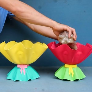 498K views · 10K reactions | Create these beautiful flower pots from discarded plastic bottles | Great DIY Idea | Facebook