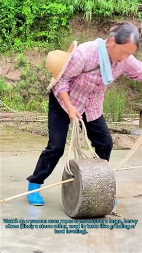 Traditional Heavy Stone Moving: Woman’s Effort