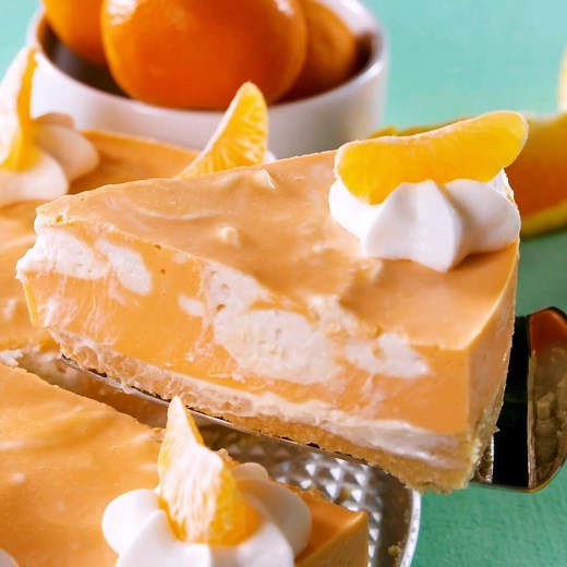 This cheesecake tastes JUST like a creamsicle. Full recipe: http://dlsh.it/xdXsHyX | Delish