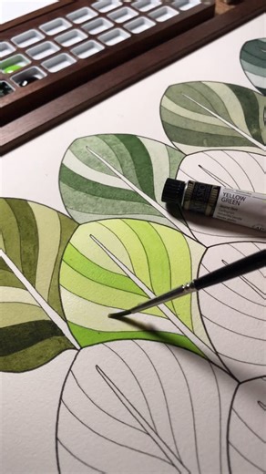 Amanda 🪴 Plant Art Café 🌿 on Instagram: "Testing my watercolor paints 🪴🌿 I’m making it one of my 2026 resolutions to get back into watercolor painting again, so I’ve decided to start with swatching ALL my paints—starting with my favorite colors, the greens. I’ve never bothered with swatching before ‘cause it’s so boring, but I thought it could be cool to turn it into a simple pattern-style Wall Art. We’ll see how it turns out, lol. SUPPLIES USED; 1. QOR — Sap Green 2. QOR — Chromium Oxide Gr