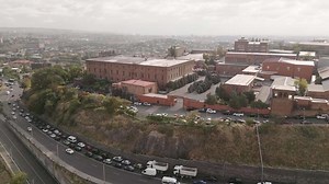 Download Yerevan, Armenia - 20th october, 2024 - aerial static view Yerevan Ararat Brandy Factory buildings. Ararat museum. Vehicles in traffic on M5 highway