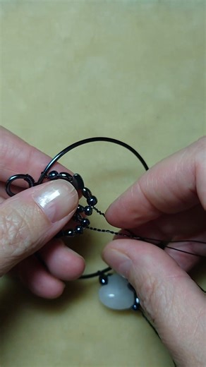 337 reactions · 33 shares | Making a tree-of-life pendant with hematite and rose quartz hearts. | Camille Sharon | Facebook