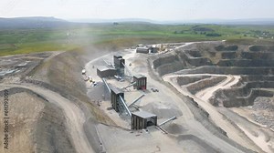 Aerial drone video of the Coldstones Cut, a large stone quarry or also open-pit mine in Yorkshire Dales, England