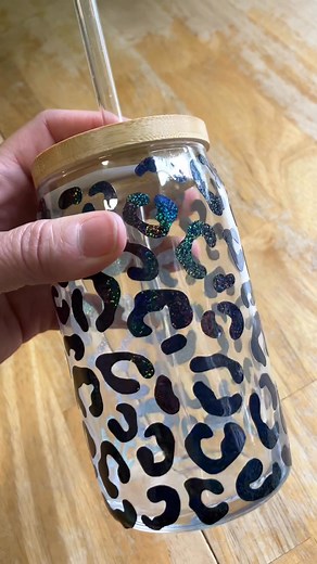 There are so many creative things you can do with leopard print vinyl decals! I ❤️ this Black Galaxy Glitter vinyl. It really sparkles and shines when the light hits it! 😍 The 4.9” by 9.5” leopard print decal is sized to fit the 16 oz glass cans. You can choose from a variety of colors to personalize to your taste! There is also a decal sized to fit the larger 20oz glass cans. #mynorthernwishes #northernwishes #leopard #leopardprint #glasscan #icedcoffee #cutecoffeemug | Northern Wishes
