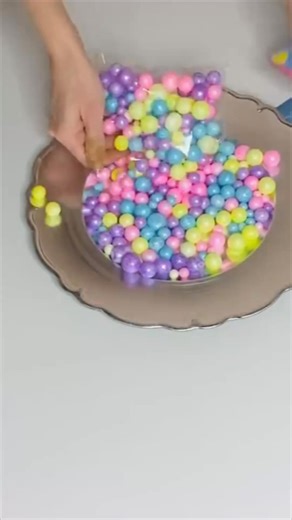 Sharing a fun and easy way to create a seasonal garland using the Dollar Tree vase filler! 🩷💙💜 | Olivia's Romantic Home DIY