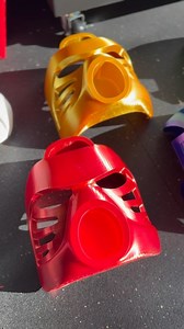 3D Printed life size Bionicle Masks! This was such a fun project to take on! I needed a cool gift for this years Makers Secret Santa. After getting @kacosplaytech and seeing his “Likes” list, Bionicle jumped out at me. He’s also a dude who can more or less make anything so I wanted this present to be an experience when he opened it. Dialing in all of these different silk PLA filaments across 7 printers wasn’t fun but it was worth it. Tahu was his favorite so I made his mask in Gold as well. The 
