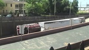 WATCH: This sped-up video shows a tractor trailer on its side being dragged out of the Wallace Tunnel after it flipped and blocked traffic on I-10 for hours Friday morning. https://bit.ly/2Lnhebt | WPMI NBC 15 News