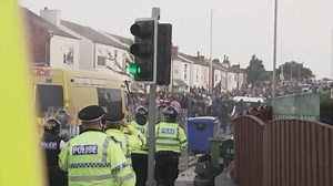 U.K. police face violent crowd in Southport