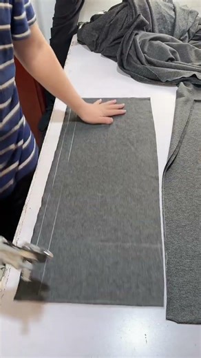 Professional electric rotary cutter to precisely cut red fabric #fabriccutting #easytutorial #shorts