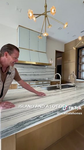 This pop-up outlet unit stays out of sight until you need it! We installed two on this particular island and it's a great way to keep your island clutter free! #leconstructionllc #luxuryelevated #luxuryhomes #homebuilder #fyp #kitchen #kitchenisland #construction #newconstruction #texas #design #interiordesign