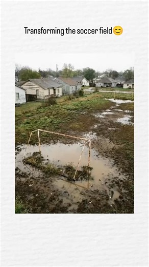 horror hub on Instagram: "This AI-generated video depicts the step-by-step renovation of a flooded, muddy soccer field into a modern artificial turf pitch with fencing, goals, benches, floodlights, and landscaping, set in a suburban neighborhood. The post from architecture-focused account has amassed over 1.5 million views and 15,000 likes, but replies highlight AI flaws like misplaced benches on the playing surface and unnatural grass texture, sparking debates on "soccer" vs. "football" termino