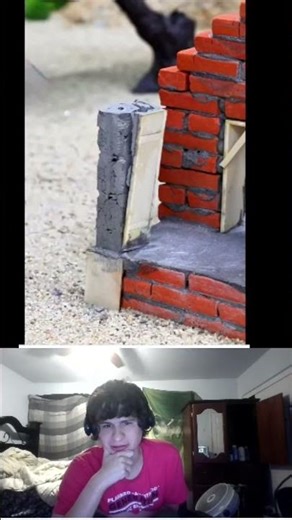"Miniature home built brick by tiny brick."
