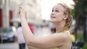 Woman taking a photo while sightseeing