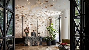 Raffles luxury condo, hotel building opens in Boston