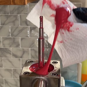 40K views · 53 reactions | Kiki Quesada of Kikiz Cosmeticz pours handmade lip glosses into containers with a filling machine. She needs to clean the machine between each use to avoid contaminating the next batch. She takes apart the machine, scoops out the residual lip gloss, and cleans each piece with hot, soapy water and a sponge. | Insider Beauty | Facebook