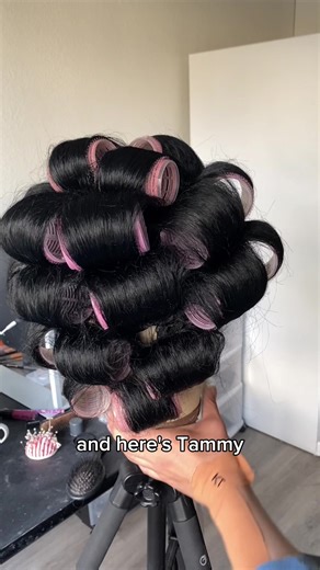 Please don’t cancel me for using Velcro rollers 🙊! Video description: Taipei is a drag queen in a blue dress and black hair. In this video, she shows footage and provides a voiceover tutorial for styling 1960s flip hair. She shows how to roll hair into a Velcro roller, apply steam, and then style the hair using a paddle brush. #60sHair #VintageHair #DragQueenWig #velcrorollers