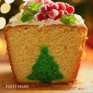 How do you get a whole tree into a cake?? Watch this: Make our Christmas Reveal Cake 👉 https://bit.ly/2Sby1Nx | Tastemade UK