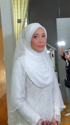 Anna Watie Makeup Artist | Thai Make up Specialist on Instagram: "N A W A L | N I K A H hijabstyling @aisyahhanisah.hassan Client request no falsies & natural makeup. Since dia features naturally look strong, this is a little game changer sis bg muka dia nmpk lg soft . tq dear for having me #muashahalam #muaklang #muaselangor #muacyber #viral"