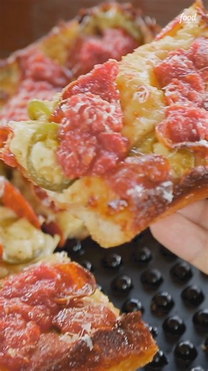 This deep-dish “HoneyPeno” pie comes fully loaded with crispy pepperoni cups, slices of jalapeño and a drizzle of hot honey 🤤🍕Try it for yourself at Izzy's Pizza Bus - Omaha! Watch #DDD with Guy Fieri Fridays at 9|8c and stream it on Max: https://streamonm.ax/49k0byb! #StreamOnMax Get the recipe: https://foodtv.com/4cfcfSD | Food Network