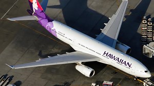 Delays at Sydney Airport cause chaos amid school holidays