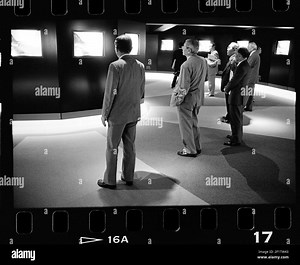 Group of people watching video screens ,Tokyo, Japan Stock Photo - Alamy