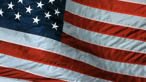 American Flag Slow Motion US Waving Flying Flag taken on High Speed Video Camera in Slowmo HD