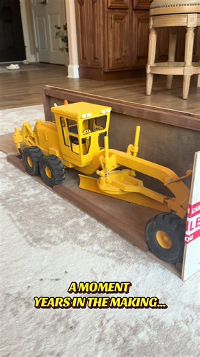 This isn’t just a grader — it’s a family story. Built entirely of wood by a brilliant craftsman, it’s a 2.5 ft long Caterpillar 12G grader with working hydraulics, turning wheels, and a fully detailed cab. Passed from great-grandfather to grandson, this gift holds generations of pride and craftsmanship. It’s a piece of our history, now carried forward. In my son’s hands, his story lives on. #FamilyLegacy #Heritage #WoodWorking #Caterpillar #Craftsmanship