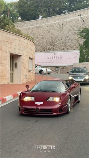 Fernando Alonso driving his New BUGATTI EB110 GT out from his collection.